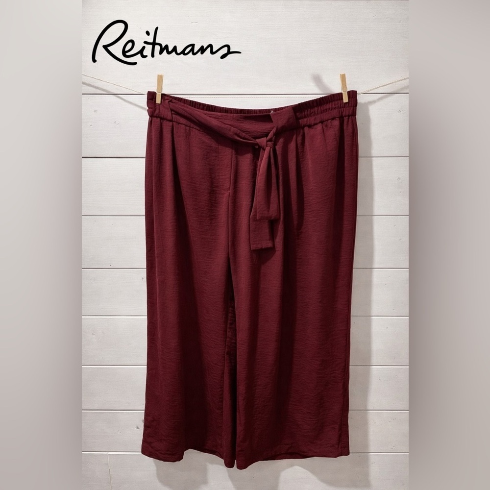 Reitmans wide-leg pants with a tied waist, size 22 petite.